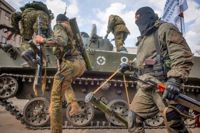 Over 400 Ukrainian troops have crossed into Russia during heavy fighting with pro-Russian separatists
