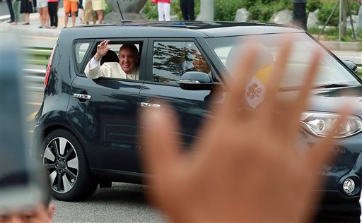 Pope Francis left Seoul airport in a compact black Kia that many South Koreans would consider too humble a conveyance for a globally powerful figure