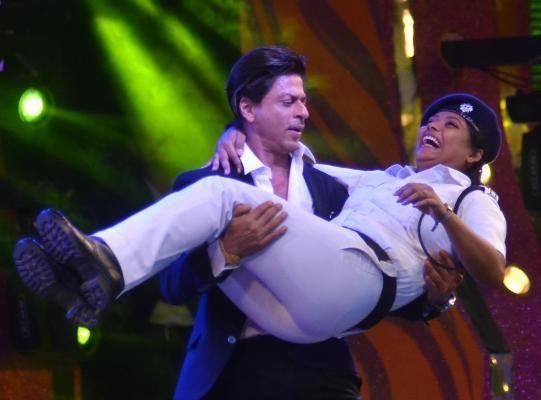 Shah Rukh Khan sparked controversy after dancing on stage with a woman officer at a police gala in West Bengal state