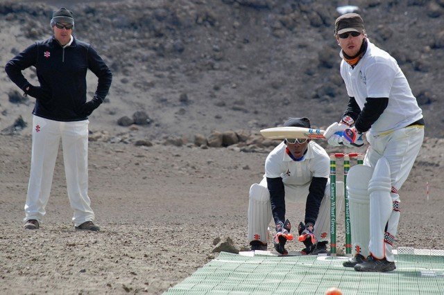 A group of international cricketers have set a world record for playing a match at the highest altitude on Kilimanjaro