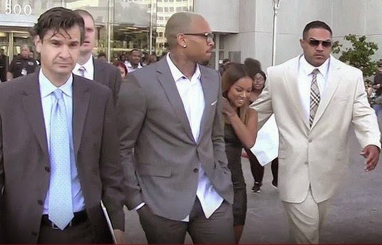 Chris Brown has pleaded guilty to punching Parker Adams outside W Hotel in Washington DC in October 2013