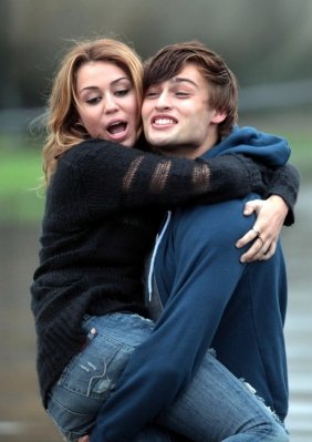 Miley Cyrus was first rumored to be romancing Douglas Booth in 2010 when they co-starred in teen drama LOL