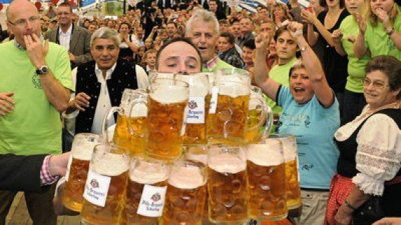 Oliver Struempfel set a new world record in beer-mug-carrying at the Gillemoos festival in Abensberg