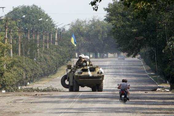 Ukraine will start the withdrawal of heavy weaponry from separatist rebel lines in the east