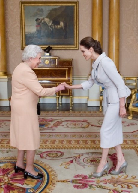 Angelina Jolie was presented with the insignia of an Honorary Dame Grand Cross of the Most Distinguished Order of St Michael and St George during a private audience at Buckingham Palace