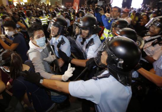 Hong Kong protesters have clashed with police in a battle for territory in the district of Mong Kok