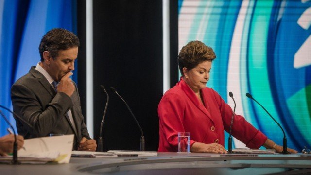 Leftist President Dilma Rousseff faces centrist Aecio Neves in the second run-off round of Brazil’s presidential election