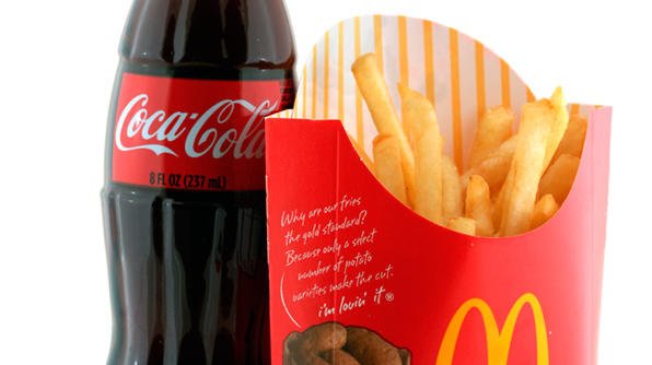 McDonald’s and Coca-Cola have posted sharply lower profits for Q3 2014