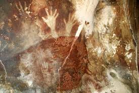 Some of the earliest cave paintings produced by humans have been identified in a rural area on the Indonesian Island of Sulawesi