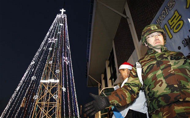 South Korea has taken down a tower used to construct a Christmas tree at the border with North Korea