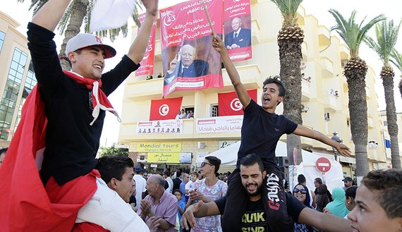 Tunisians are voting to elect the country’s first full parliament under a new constitution passed earlier this year