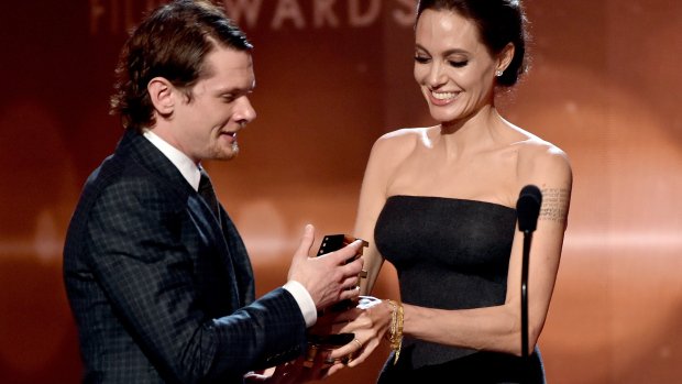 Angelina Jolie greeted Jack O'Connell with "ay up me duck" at Hollywood Film Awards
