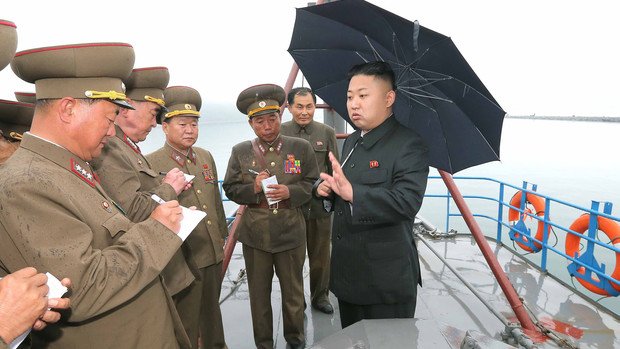 Kim Jong-un pictured walking without a cane at an army meeting, following speculation about his health