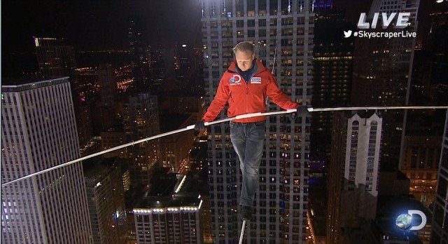 Nik Wallenda achieved the Chicago skyscraper crossings without a safety net or a harness