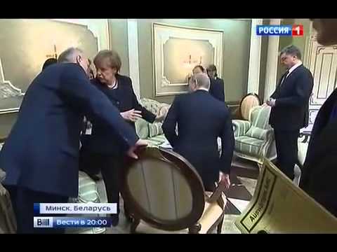 Alexander Lukashenko pulls chair on Vladimir Putin