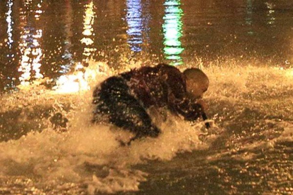 Kanye West jumps into lake during Armenia concert