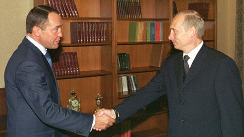 Vladimir Putin and Mikhail Lesin