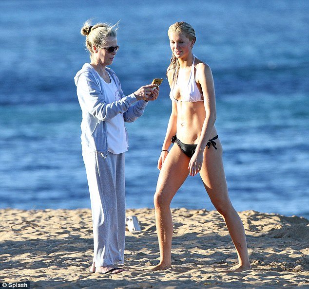 Ireland Baldwin and Kim Basinger on the beach in Hawaii.